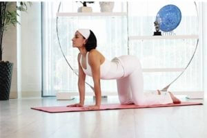 Practicing prostate cancer yoga postures